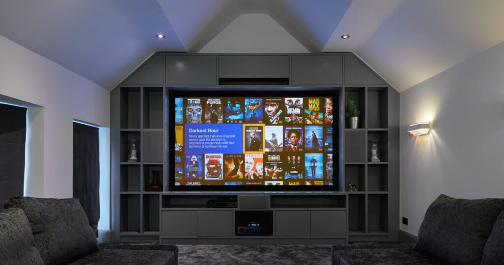entertainment center in a home, a big screen